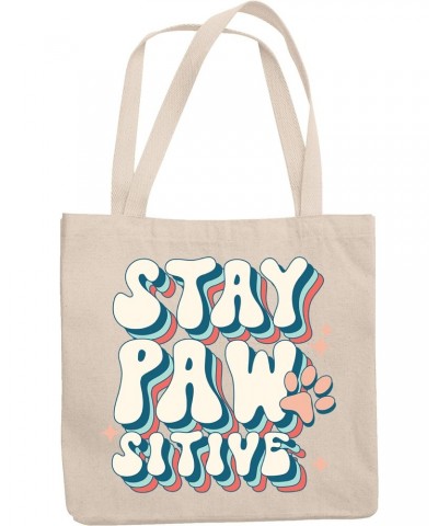 Stay Pawsitive Pun with a Dog or Cat Paw Art Merch Gift, 12oz Canvas Tote Bag $14.30 Totes